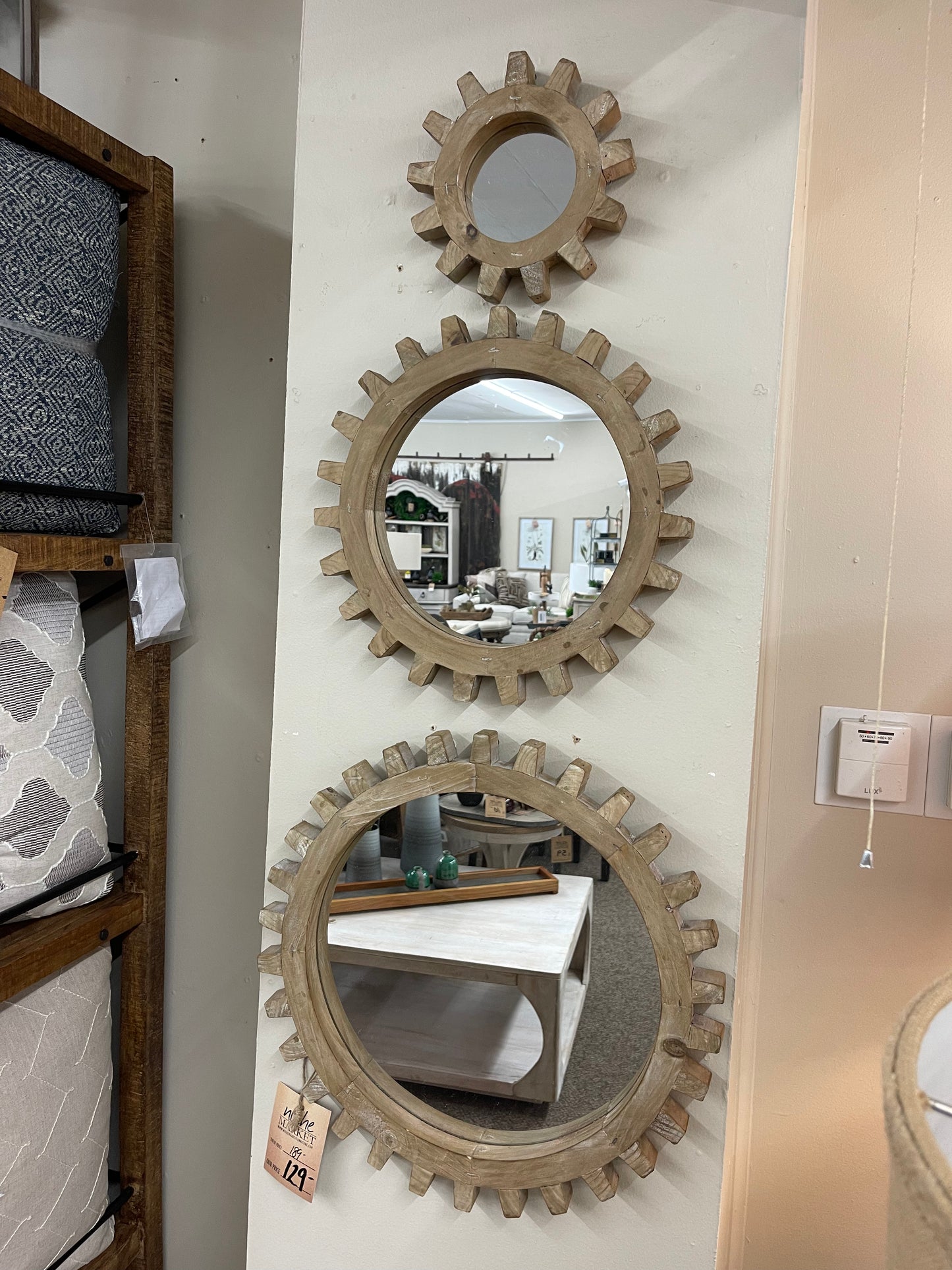 set of three wooden gears mirror